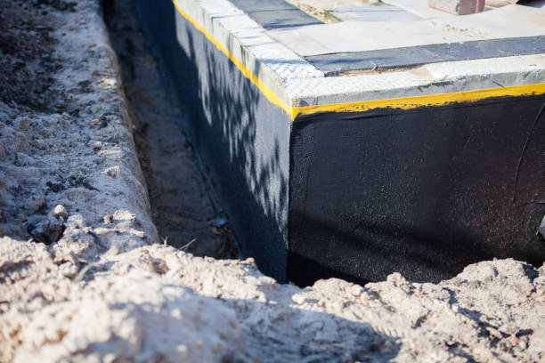 Professional Waterproofing technician working in Pine Brook, NJ